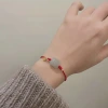 In the year of one's zodiac sign, the tiger will be full of vigor. Red rope woven bracelet, Hetian jade Auspicious Tiger lucky red rope bracelet gift, couple style details Picture